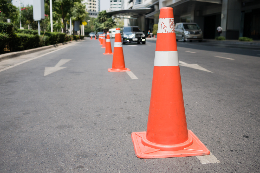 Traffic management cones on a street.